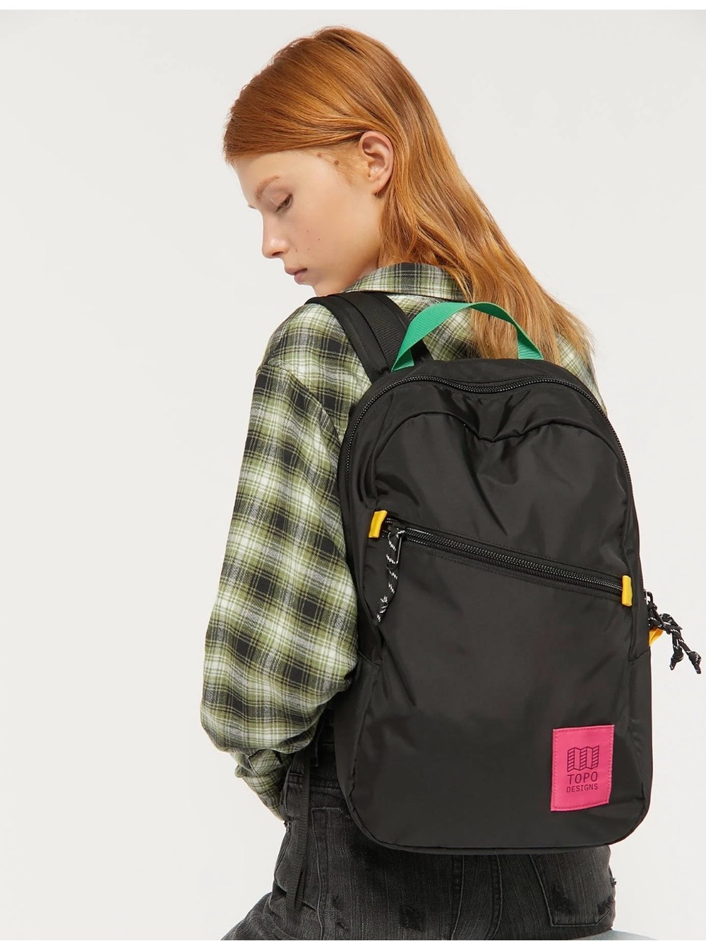 Topo Designs Black Backpack with Green Carry Handle and Pink Logo Patch